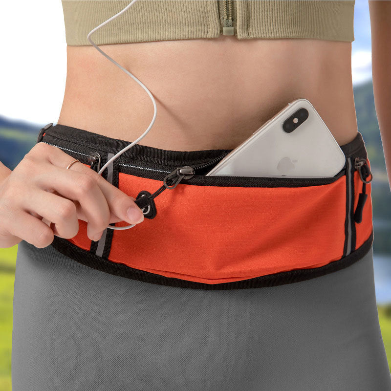 Ceinture de running avec poches zippées et sortie écouteurs.